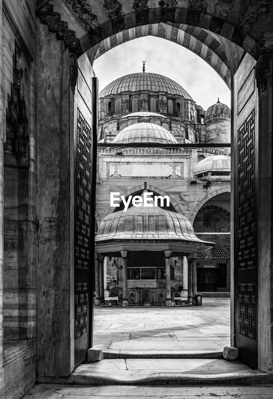 Black and white view of sehzade mosque courtyard from the entrance door, istanbul, turkey