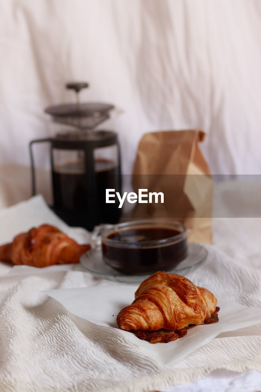 Freshly baked croissants to be paired with coffee for a simple french breakfast