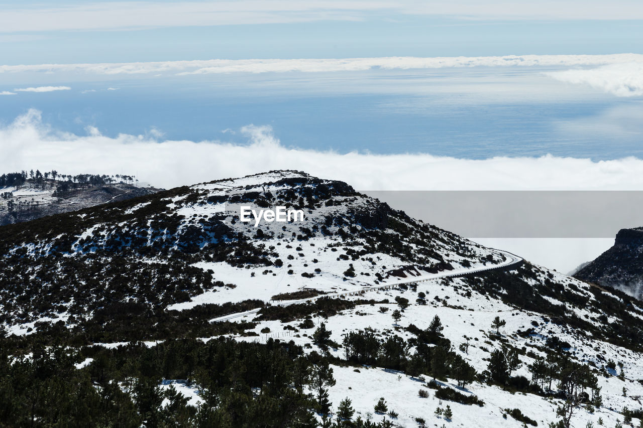 Road to pico do areeiro mountain covered with snow in madeira island