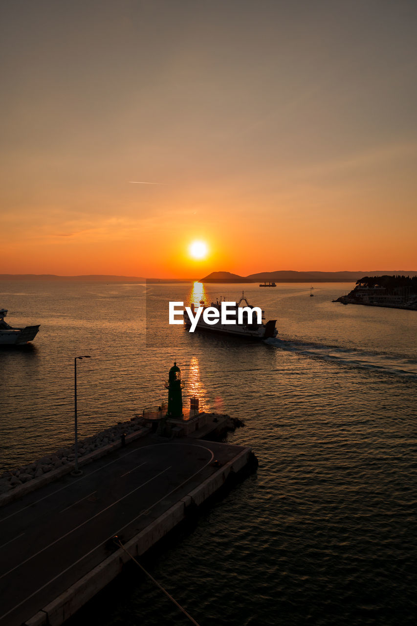 VIEW OF SEA AGAINST SKY DURING SUNSET