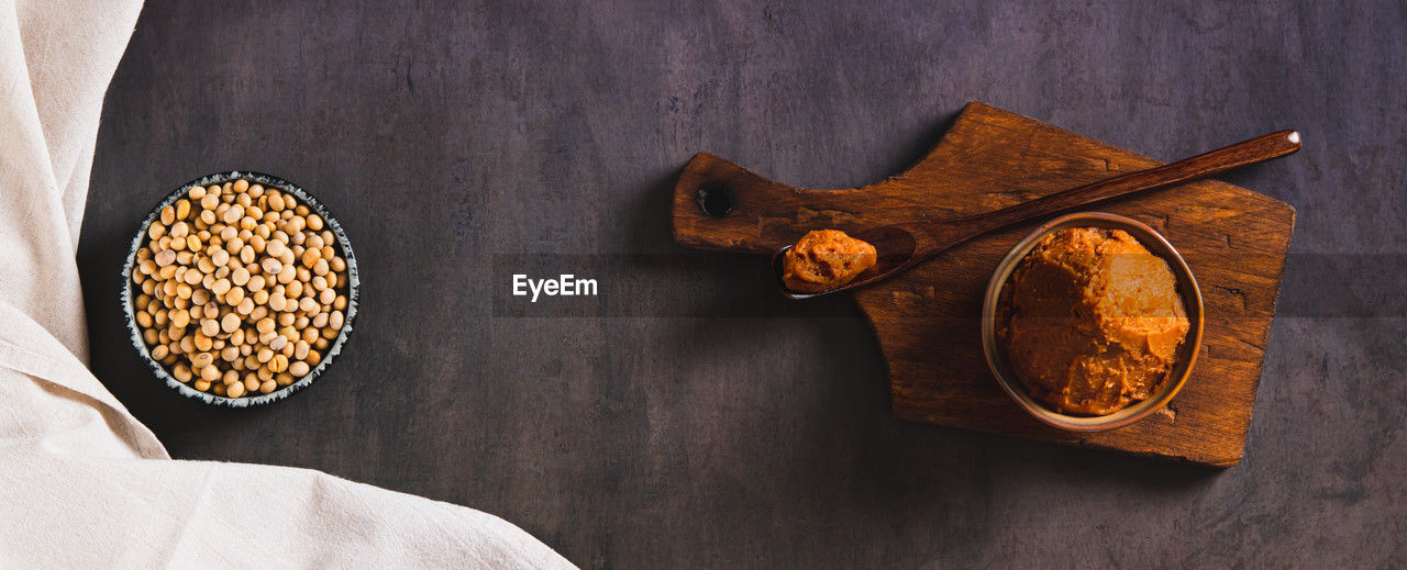 Soybean paste for snack in a bowl on the table top view web banner