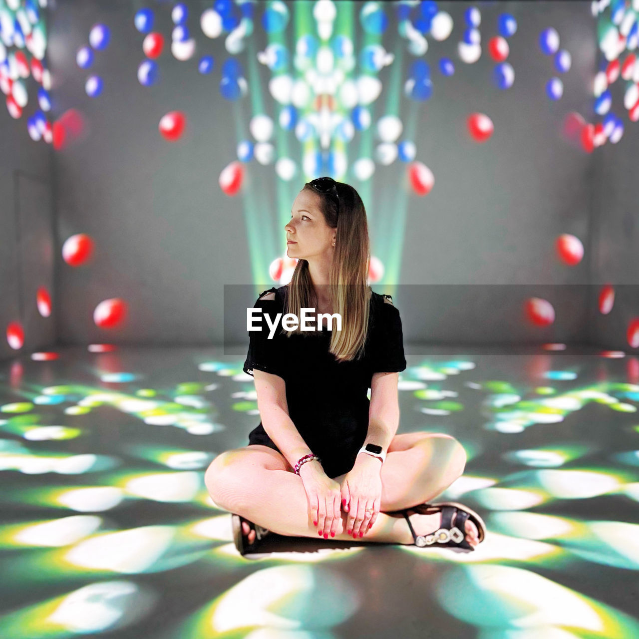 one person, adult, women, sitting, full length, young adult, lifestyles, yoga, relaxation, female, nature, cross-legged, meditating, exercising, illuminated, clothing, indoors, zen-like, emotion, multi colored, contemplation, night, sports, arts culture and entertainment, hairstyle