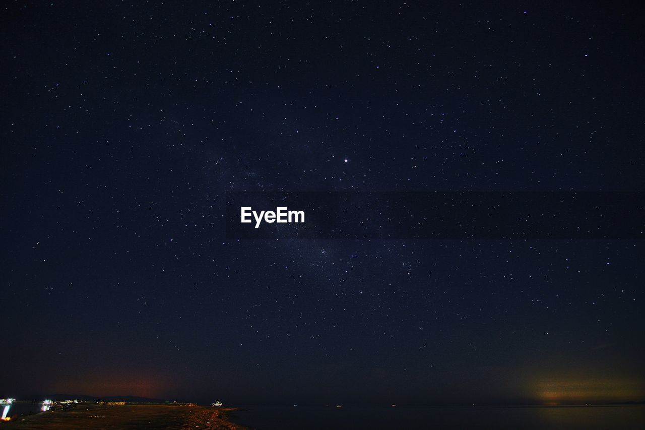 Low angle view of star field against sky at night