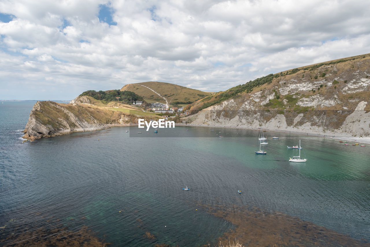 Landscape photo of lulworth cove in dorset.