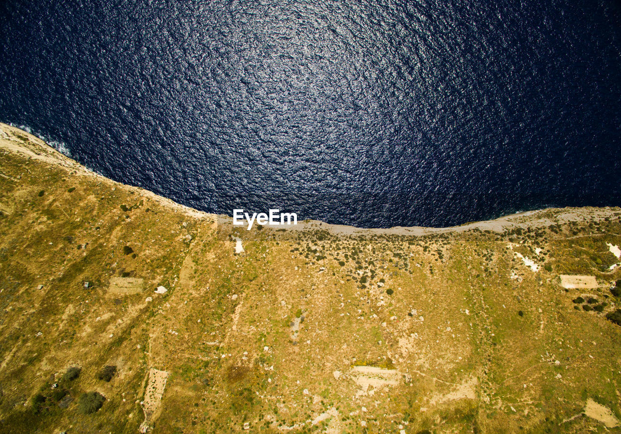 Aerial view of cliff by sea at dingli