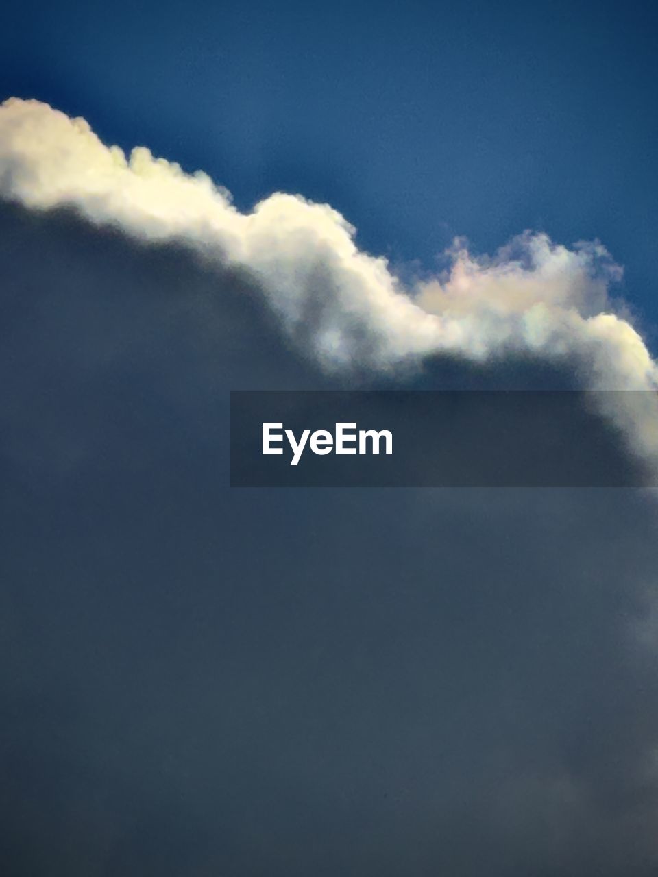 sky, cloud, nature, no people, sunlight, blue, environment, beauty in nature, cloudscape, outdoors, day, backgrounds, low angle view, copy space, smoke