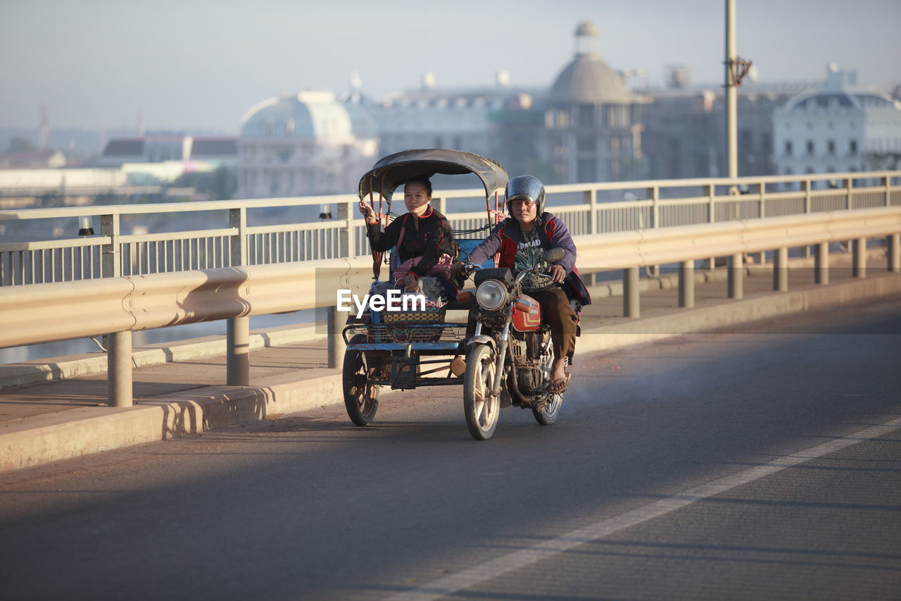 BICYCLES ON ROAD IN CITY