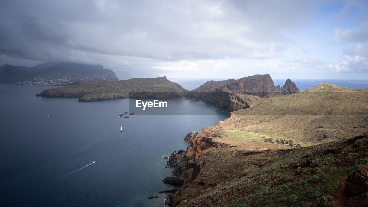 Beautiful landscape with islands, archipelago and cliffs with storm clouds, madeira, portugal