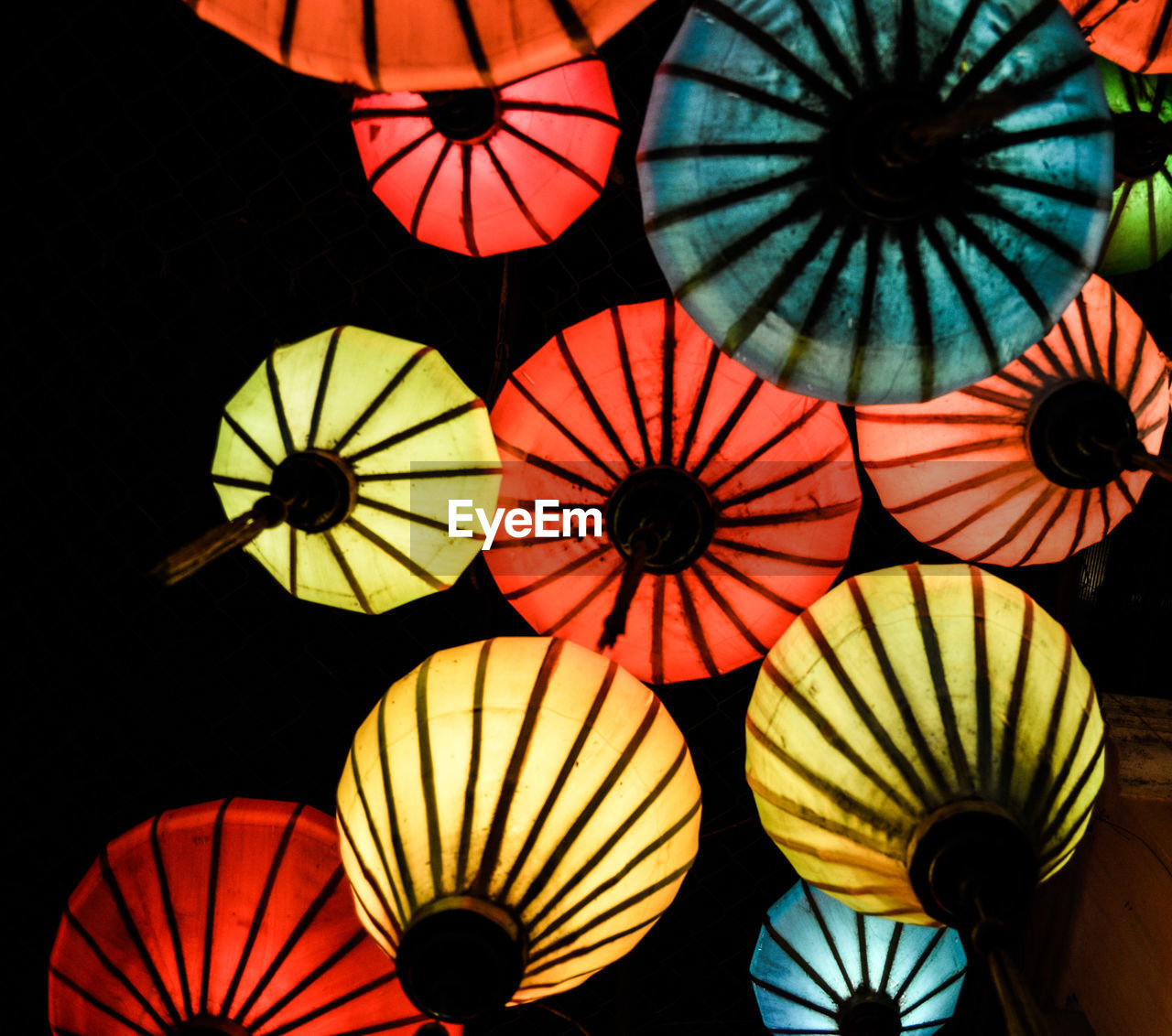 Low angle view of illuminated lighting decorations