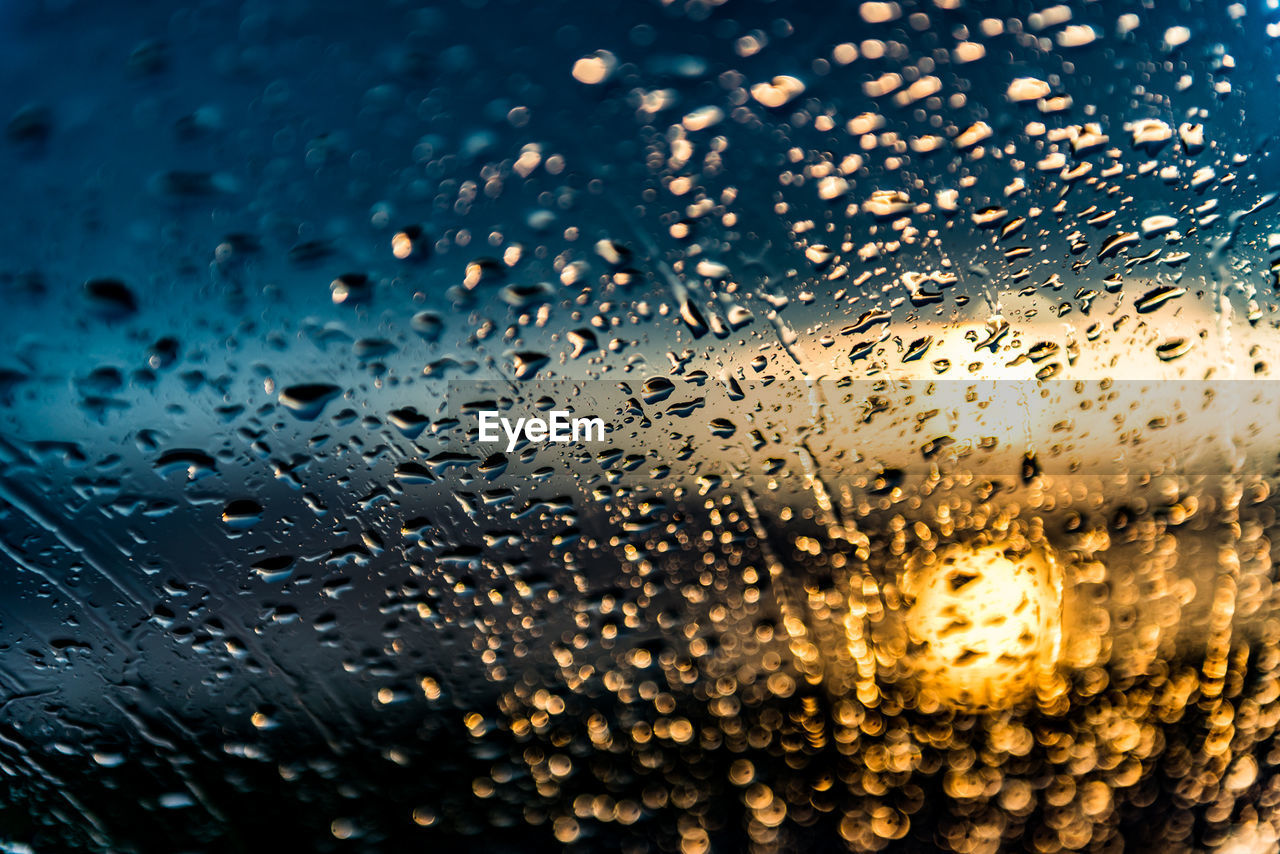 Full frame shot of wet car windshield