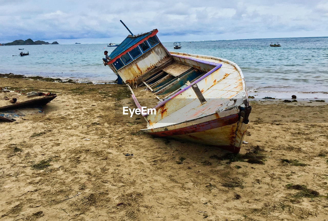 FISHING BOAT ON BEACH