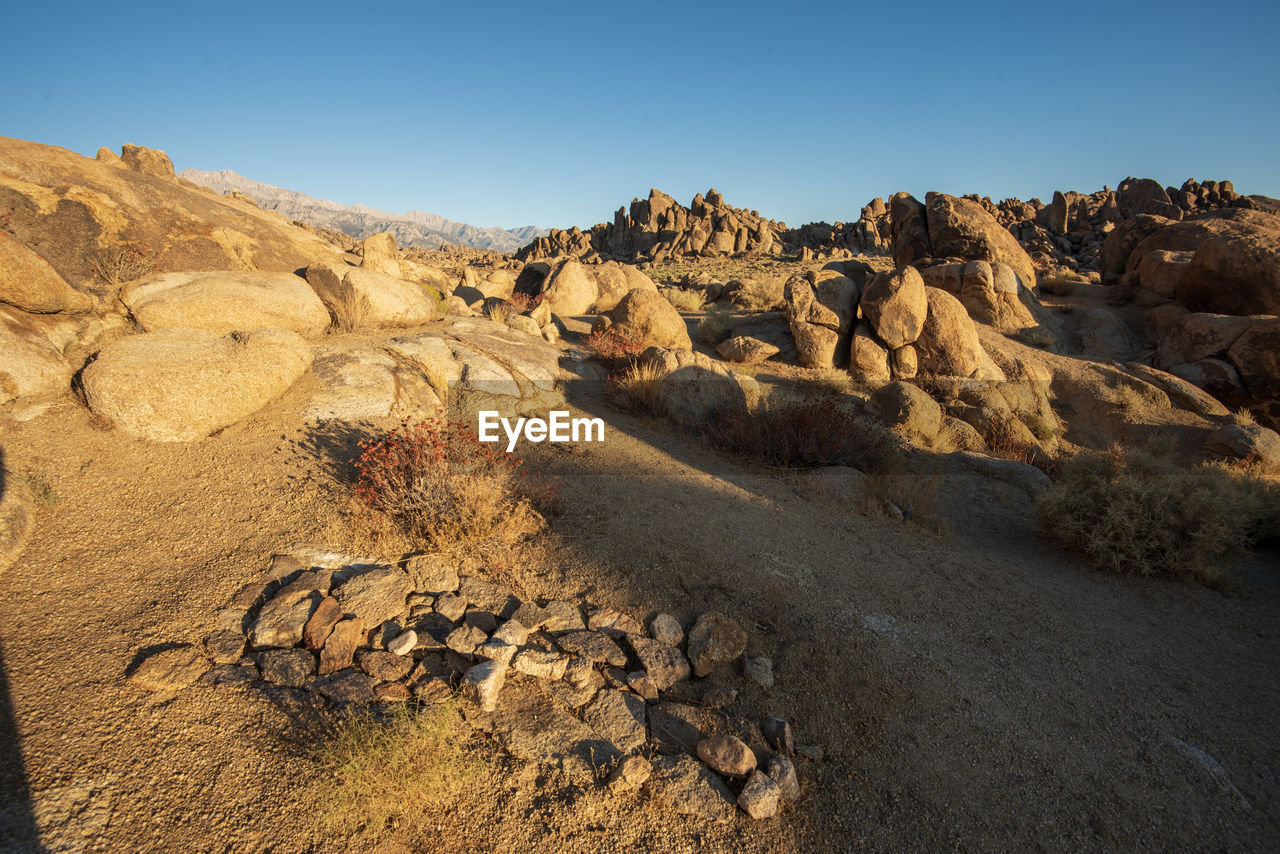 View of rock formations in desert against sky