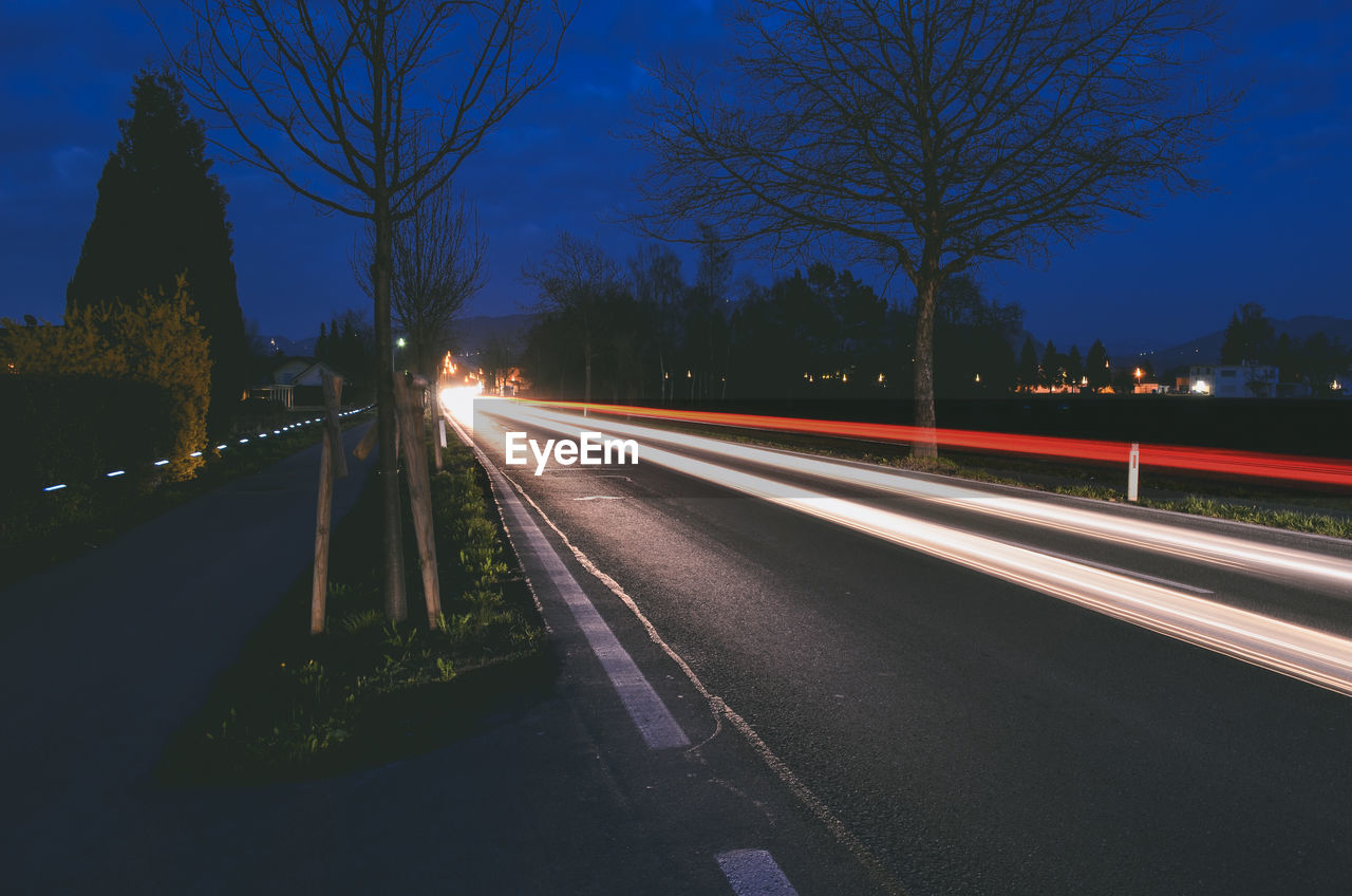 Light trails on road at night