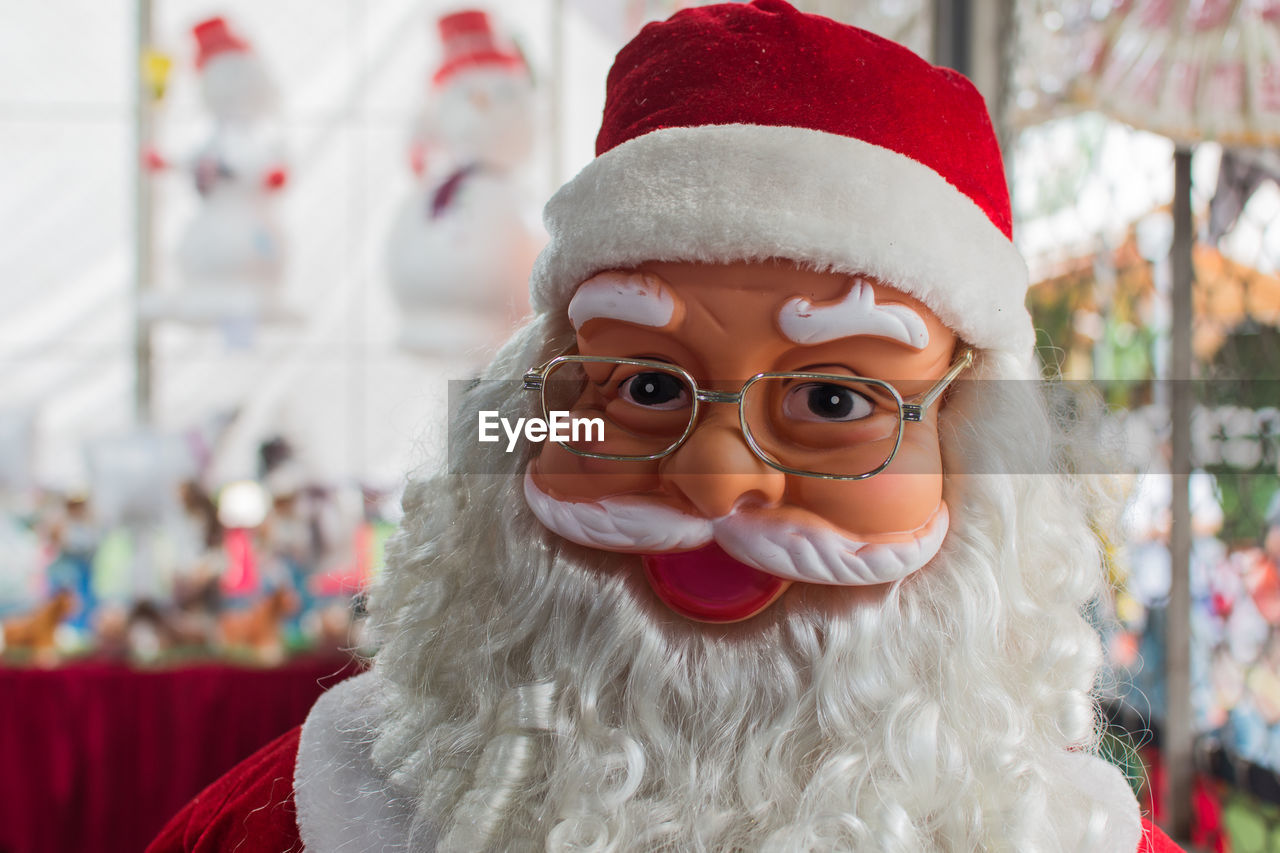 Close-up of person in santa claus costume