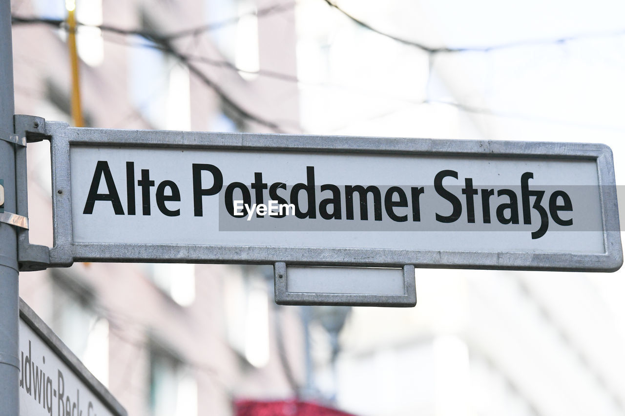 Alte potsdamer strasse street name sign. the place is the new modern city center
