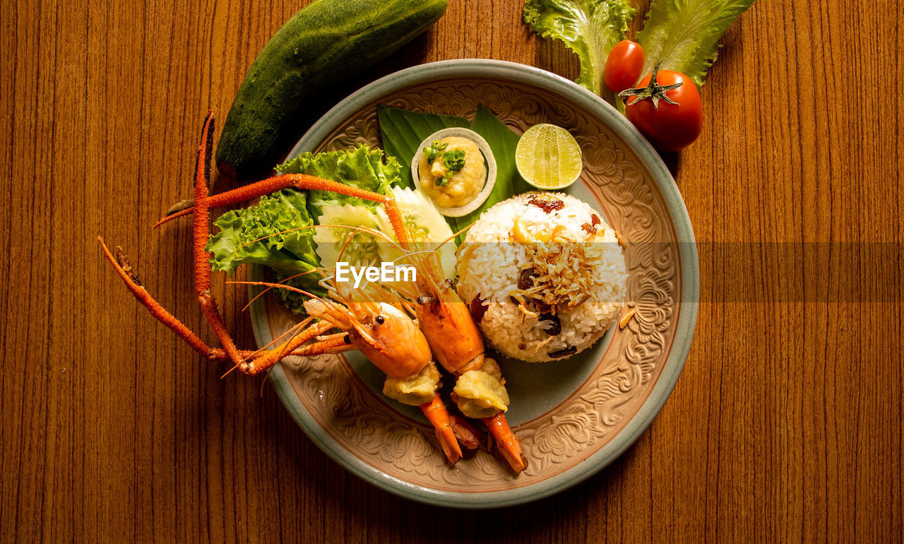 HIGH ANGLE VIEW OF MEAL SERVED ON TABLE