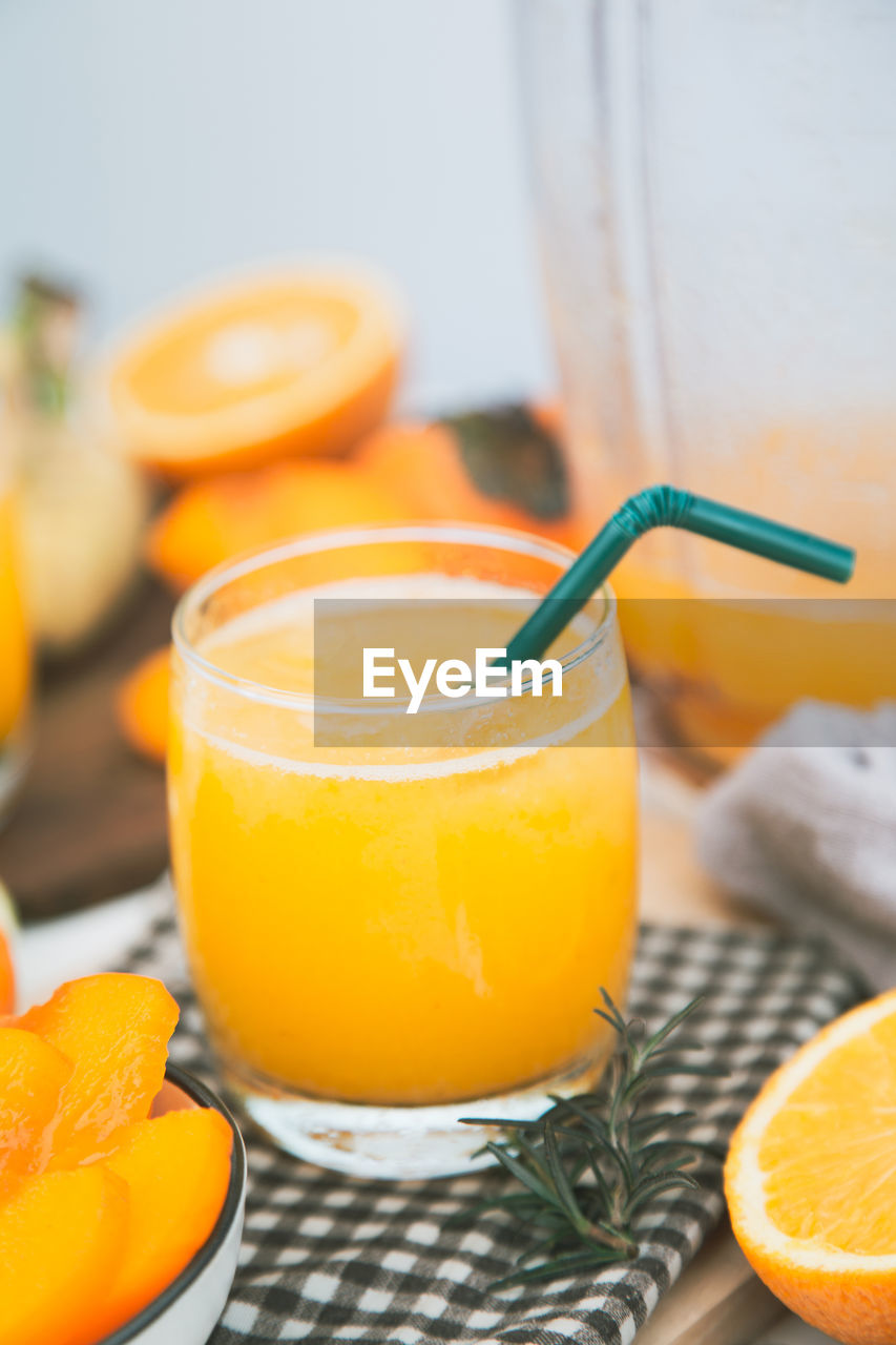 close-up of orange juice on table
