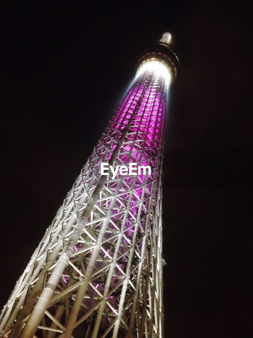 LOW ANGLE VIEW OF ILLUMINATED LAMP POST