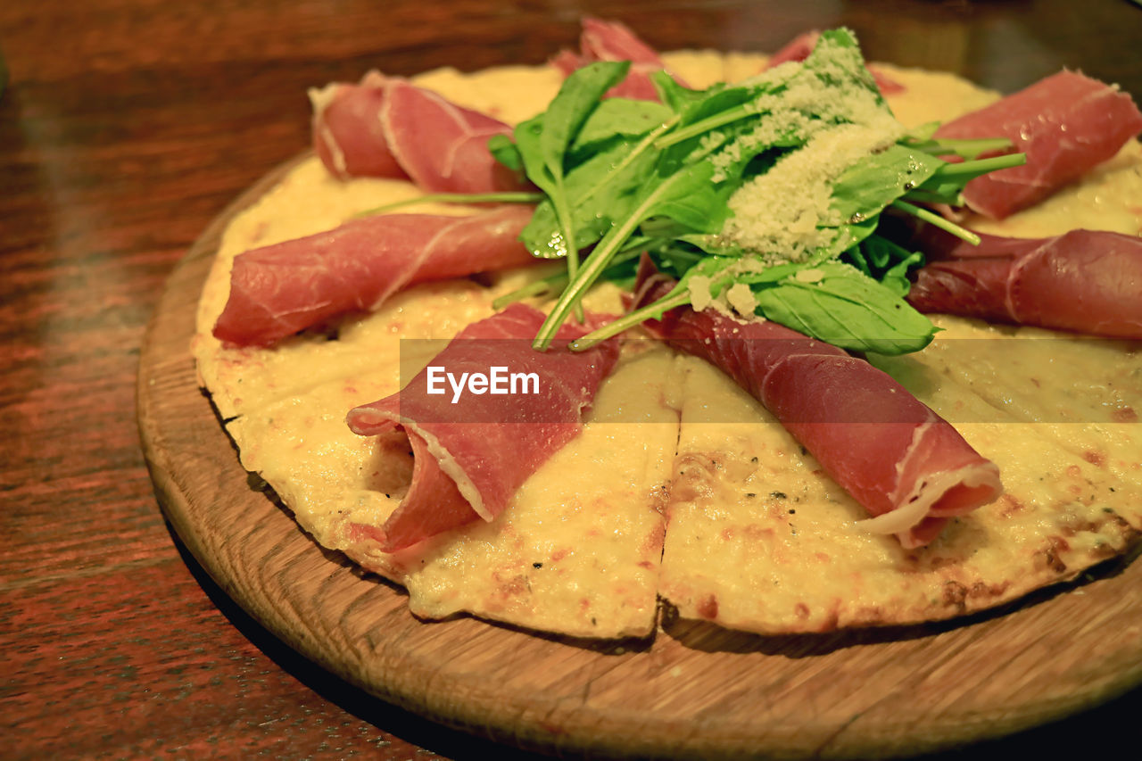 CLOSE-UP OF FOOD ON TABLE