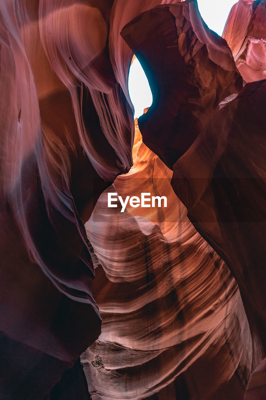 LOW ANGLE VIEW OF ROCK FORMATION AT CANYON