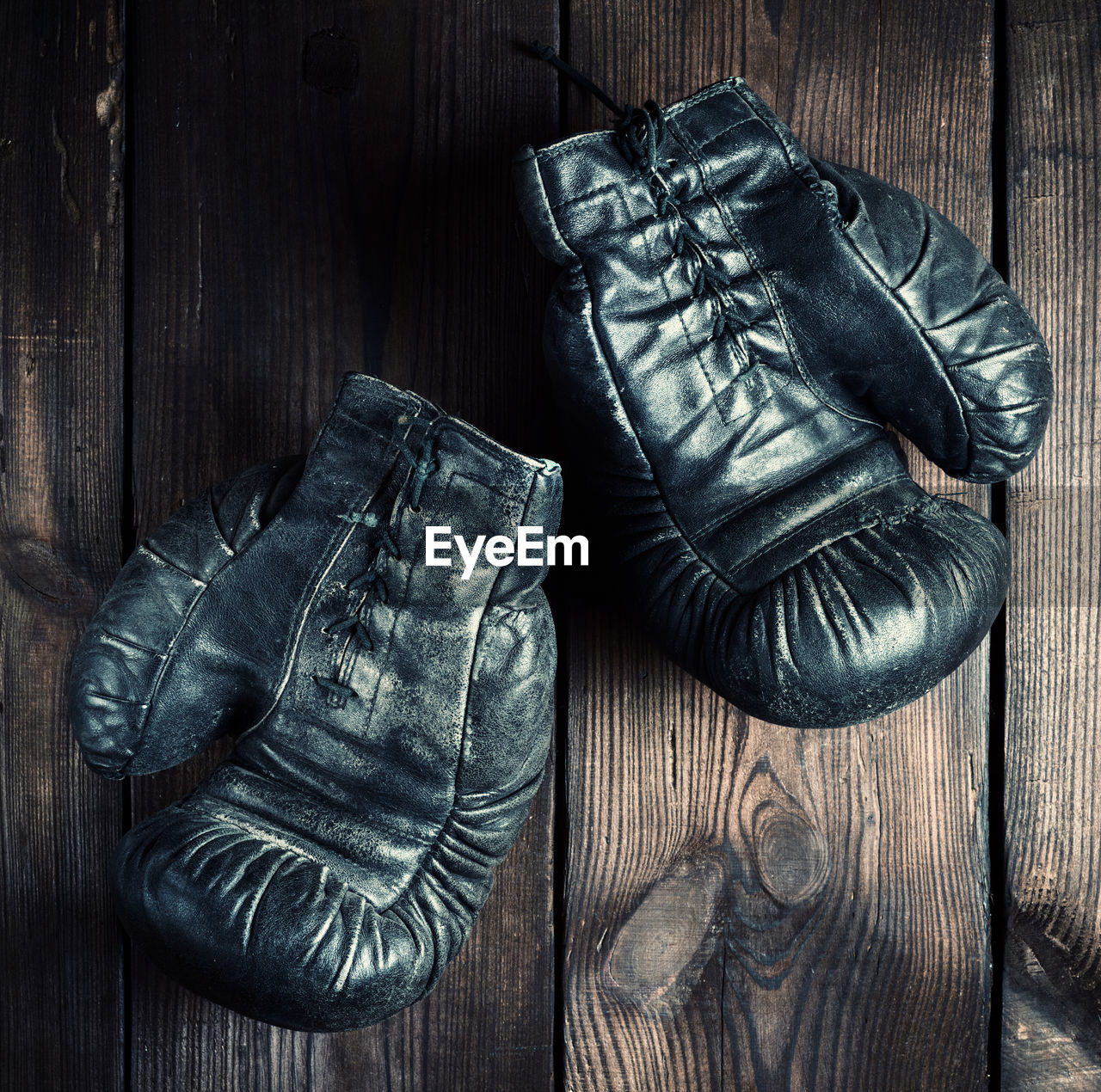 Directly above shot of boxing gloves on table