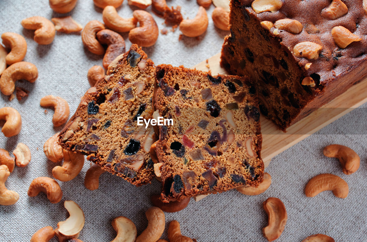 Sliced fruit cake with cashew nuts