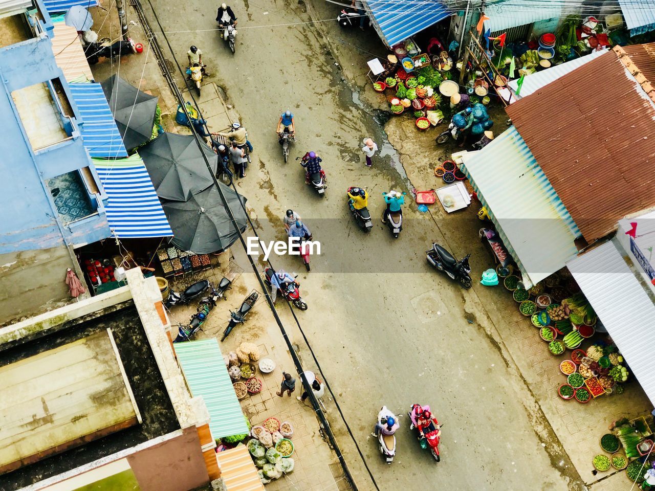 High angle view of people at market in city