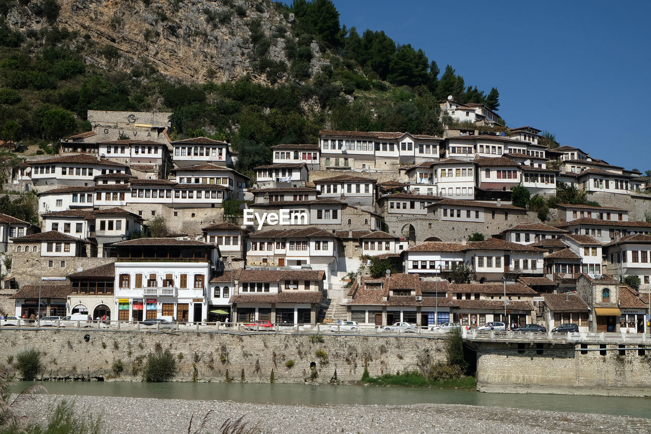 Traditional ottoman houses in old town berat known as the white city of albania