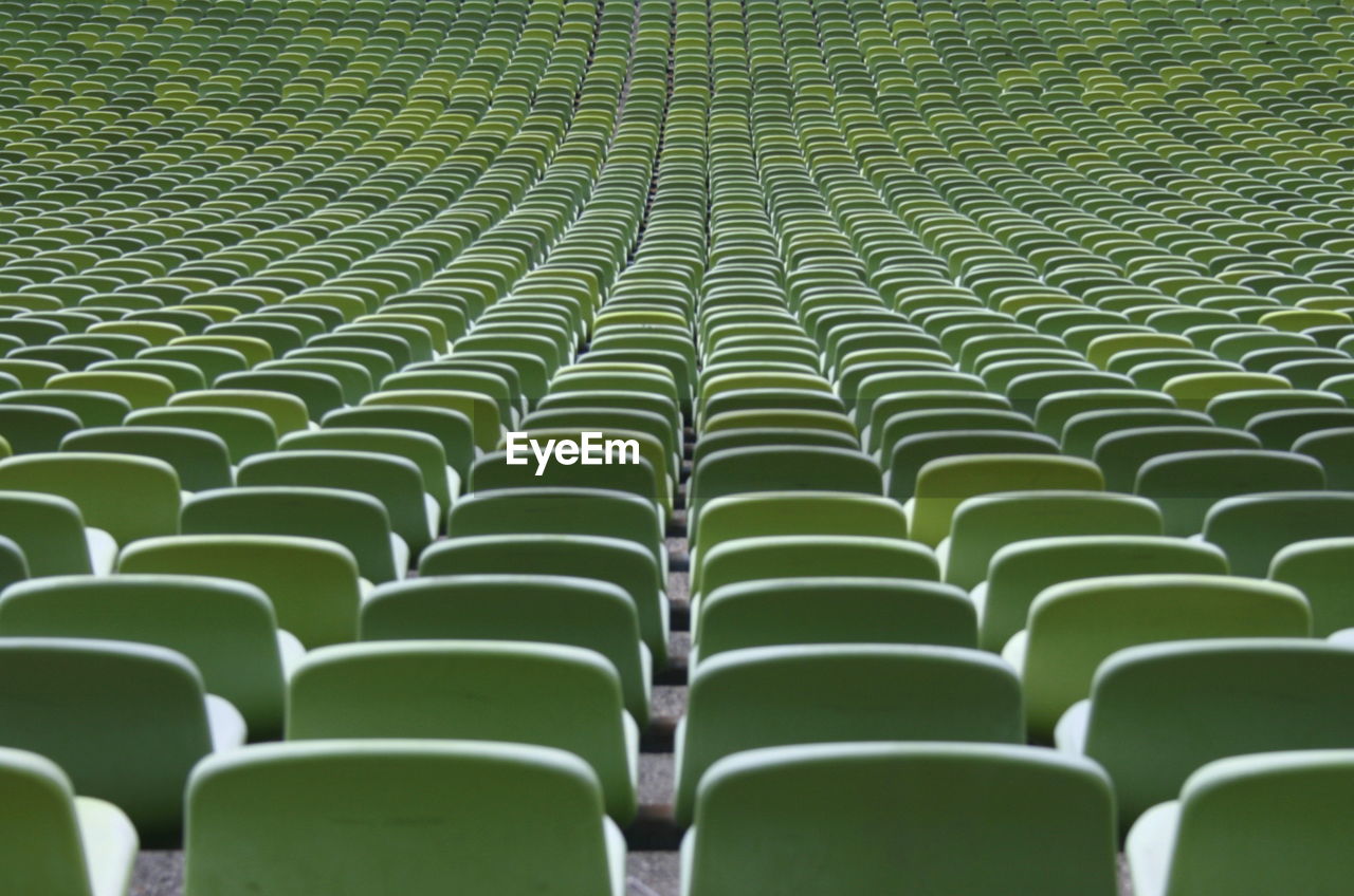 Full frame shot of empty bleachers in stadium