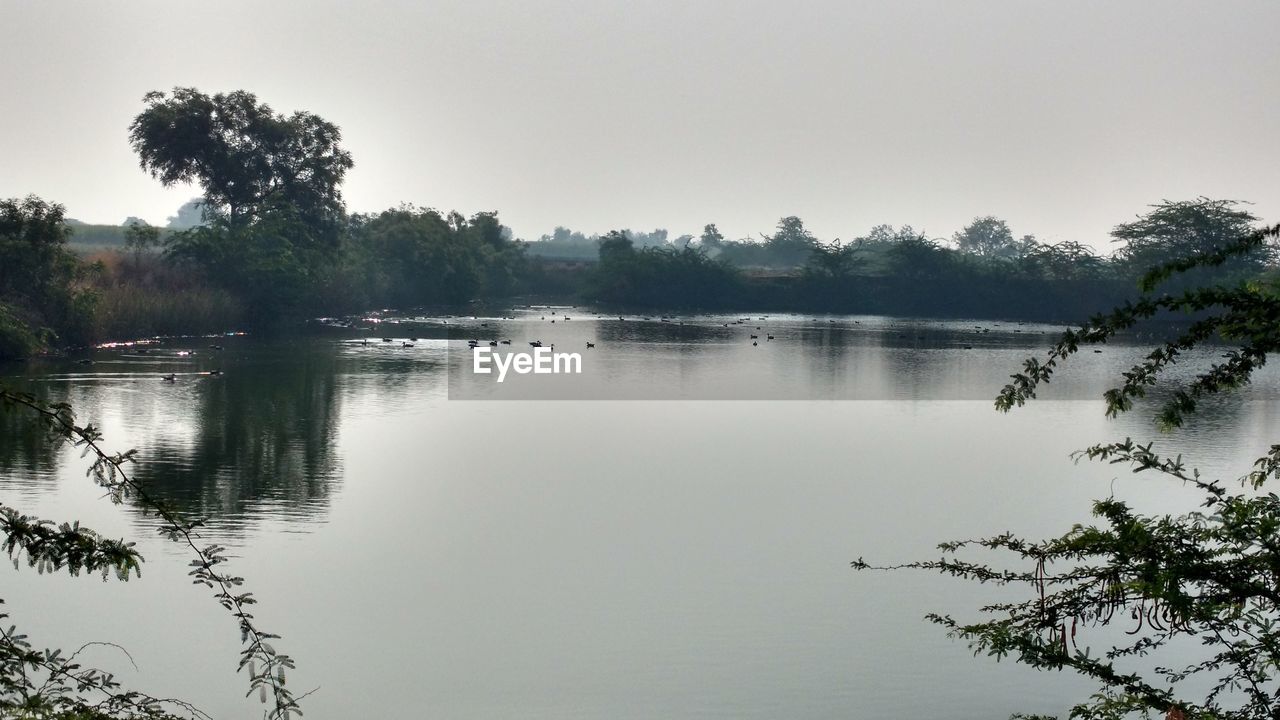 Scenic view of lake against clear sky