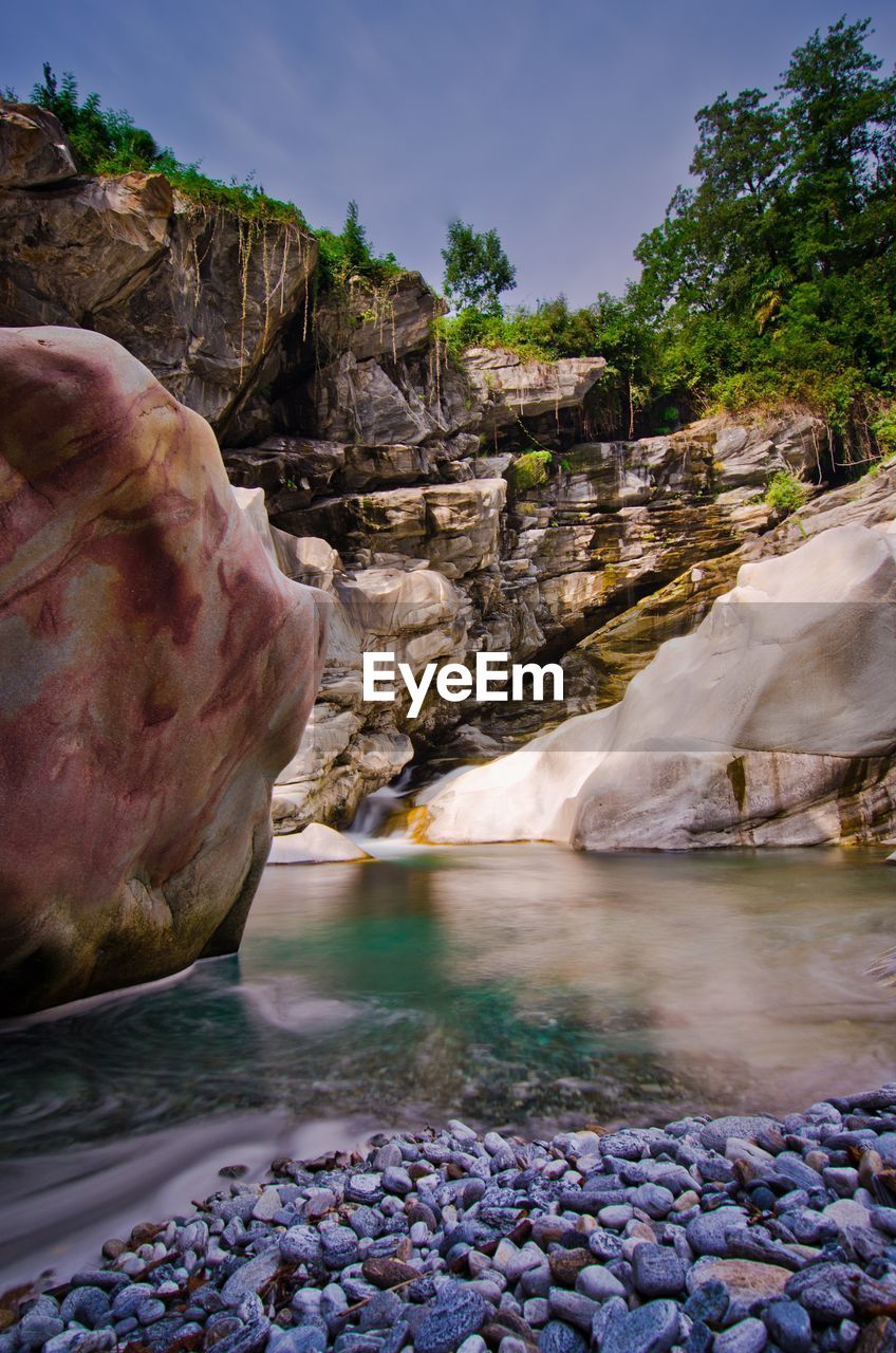 ROCK FORMATIONS IN A FOREST