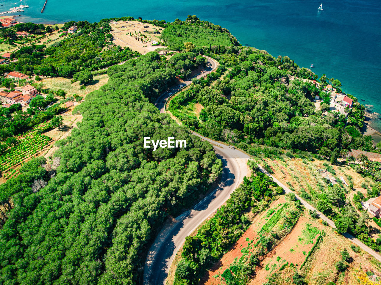 Drone shot of an italian street in front of the sea