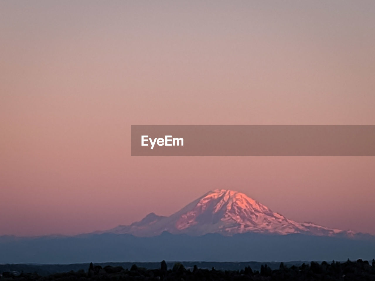 SCENIC VIEW OF MOUNTAINS DURING SUNSET