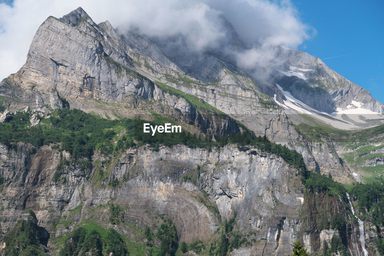 Scenic view of rocky mountains against sky