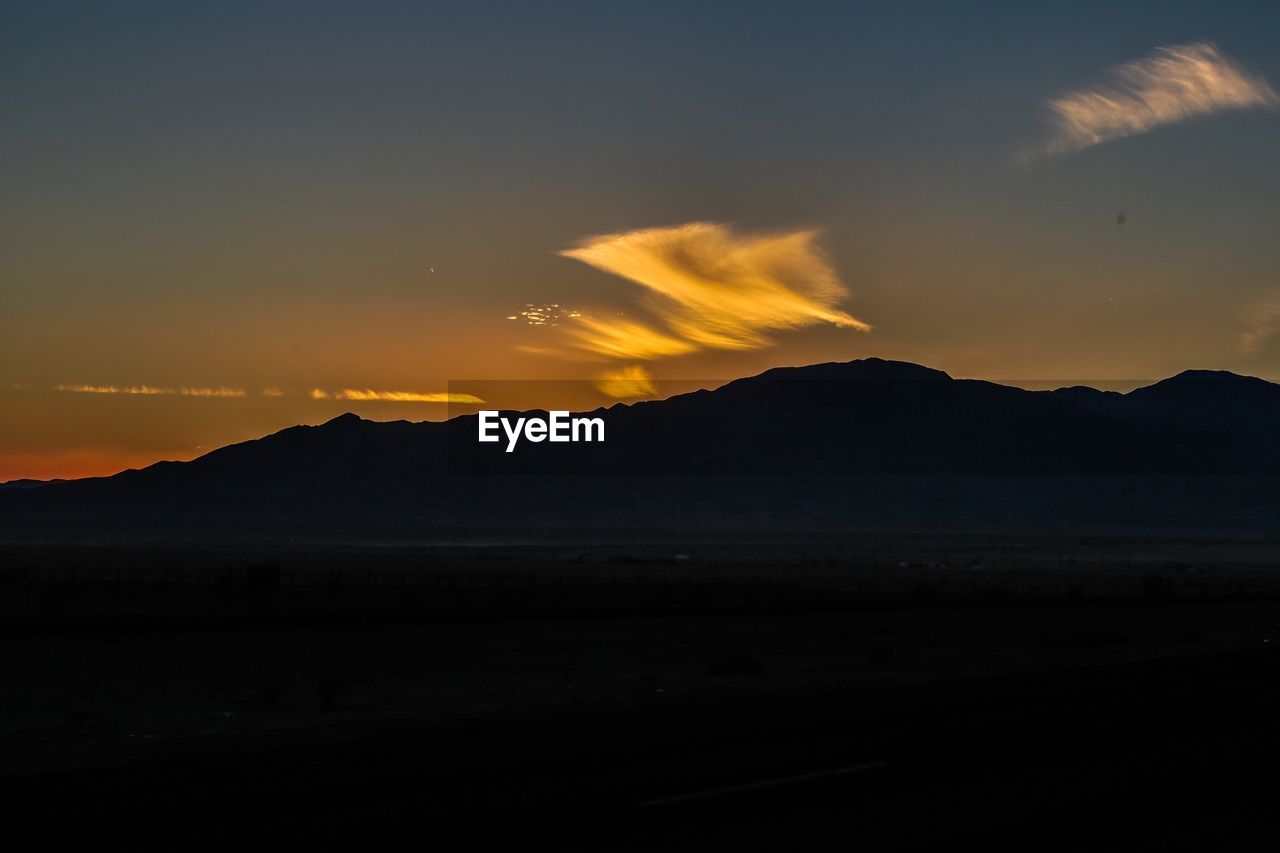 Idyllic shot of landscape against sky during sunset