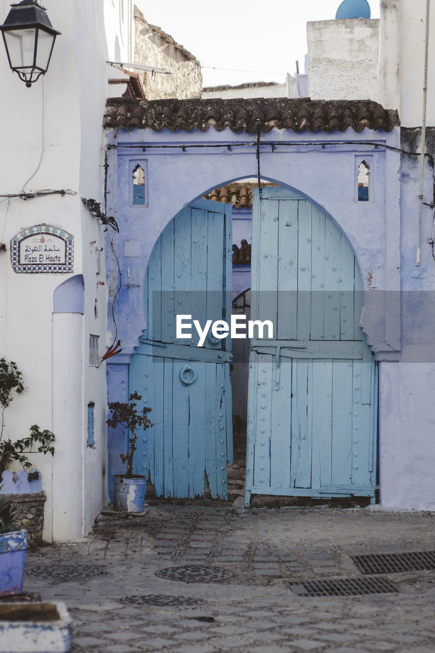Closed door of abandoned house in chefchaouen 