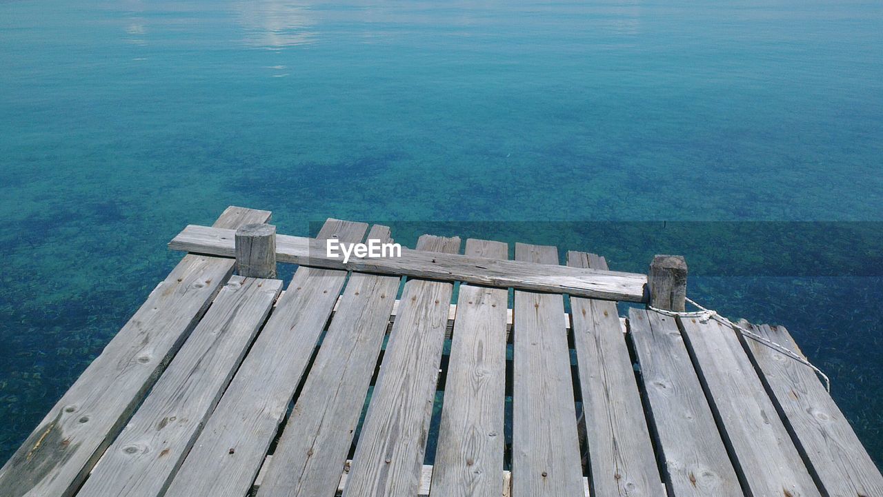 Wooden pier against sea