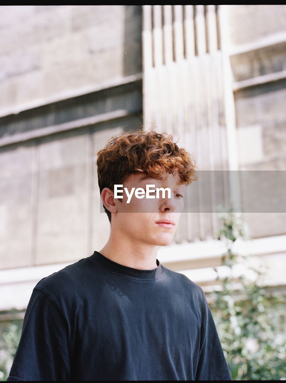 PORTRAIT OF A YOUNG MAN LOOKING AWAY