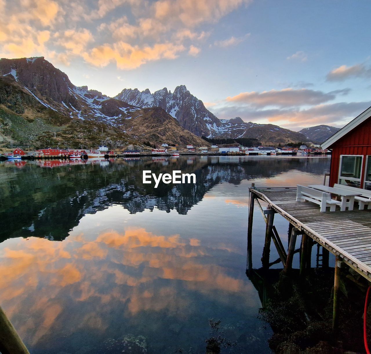 Scenic view of lake against sky during sunset from rorbu in lofoten, norway