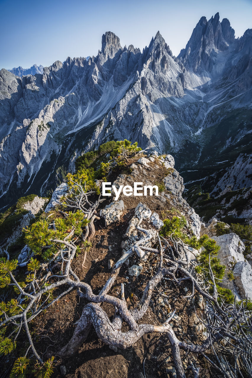 SCENIC VIEW OF ROCKS AGAINST SKY