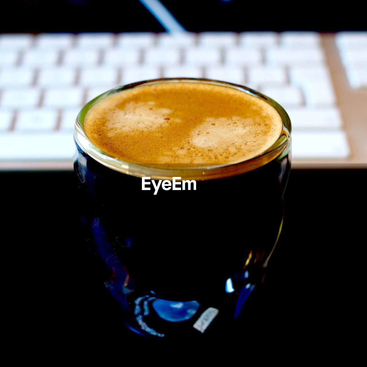 Close-up of coffee cup on table