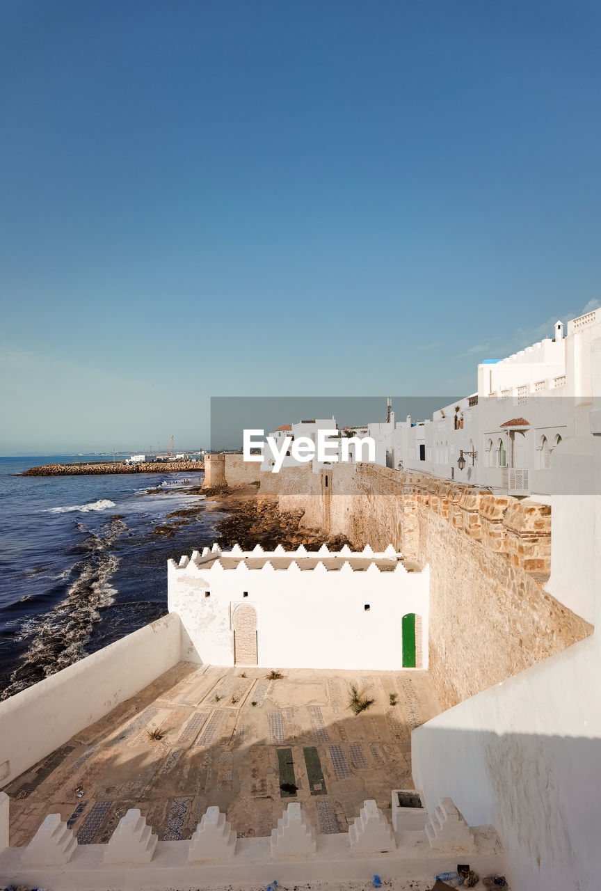 Aerial view over the old medina of asilah with the coast in morocco