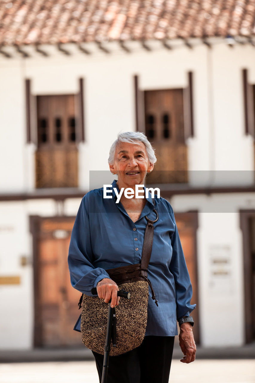 Senior woman tourist at the heritage town of salamina in the department of caldas in colombia