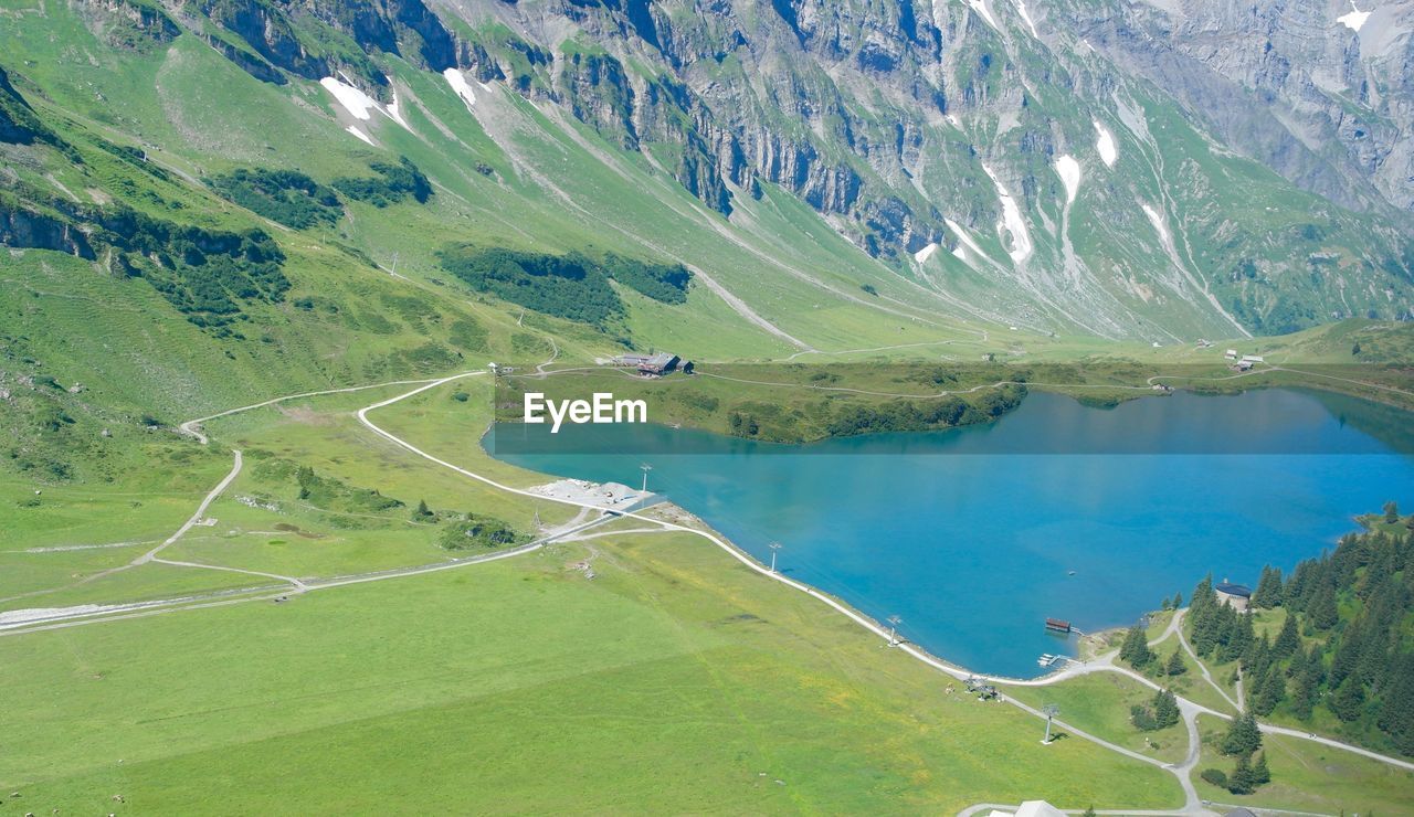 High angle view of lake amidst land