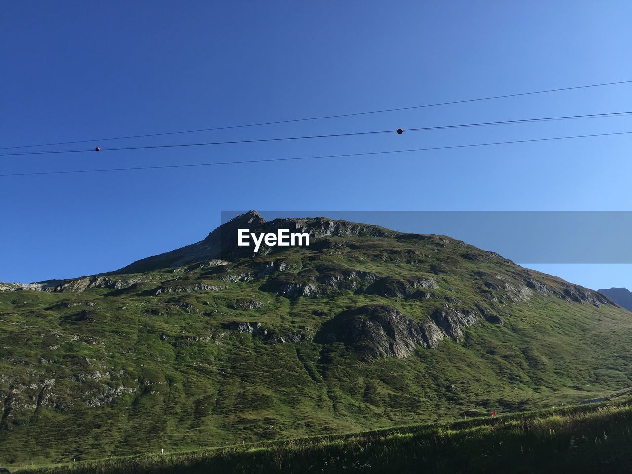 Low angle view of mountain against clear sky