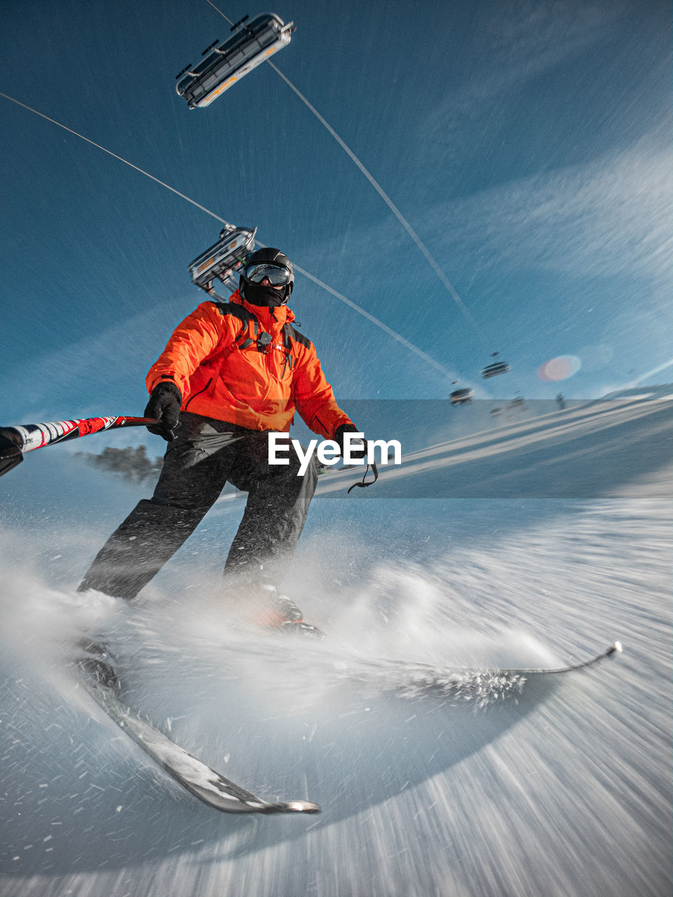 Man skiing on snow covered landscape