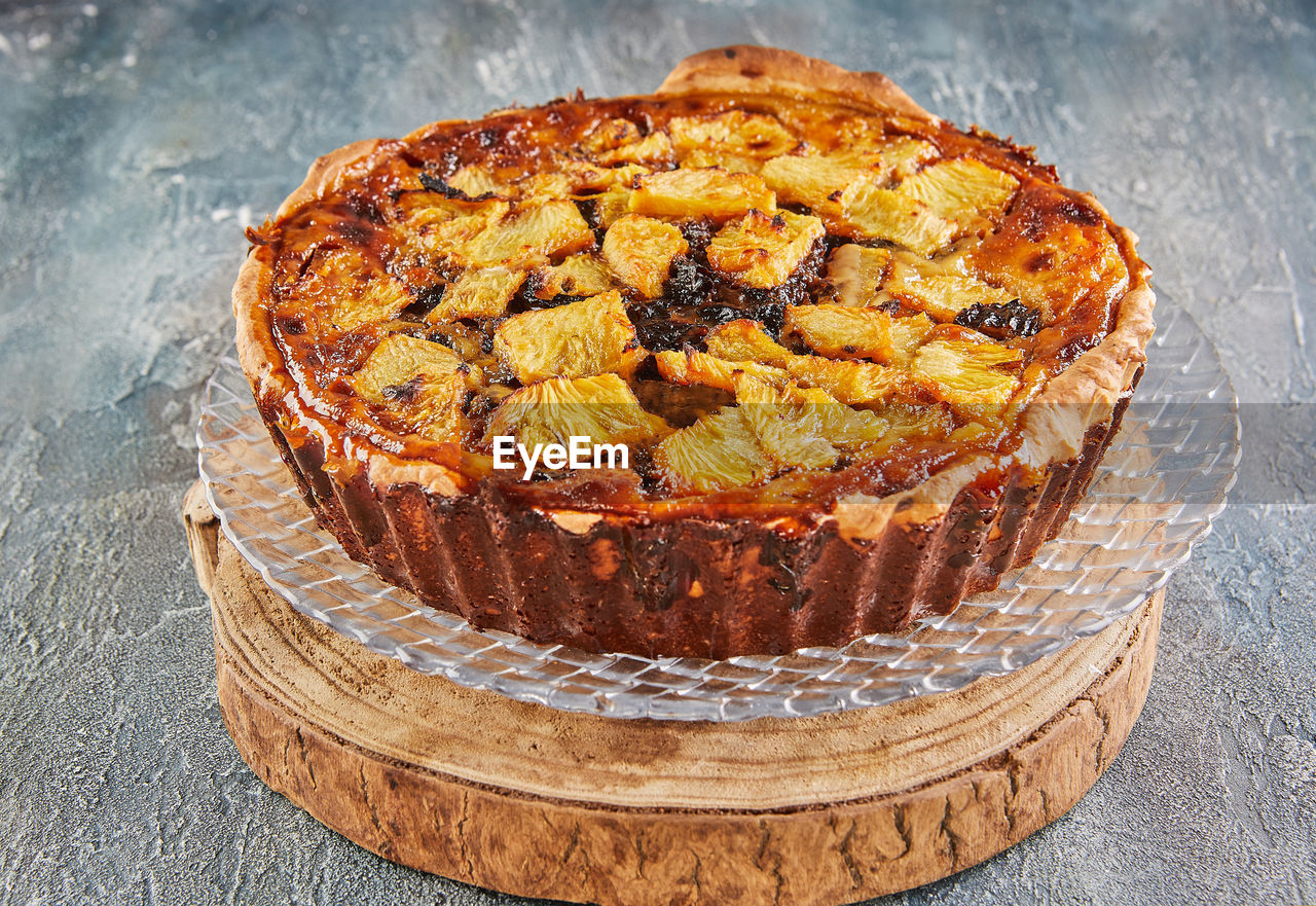 Winter torte with apricots, plums, bananas and pineapple. french gourmet cuisine
