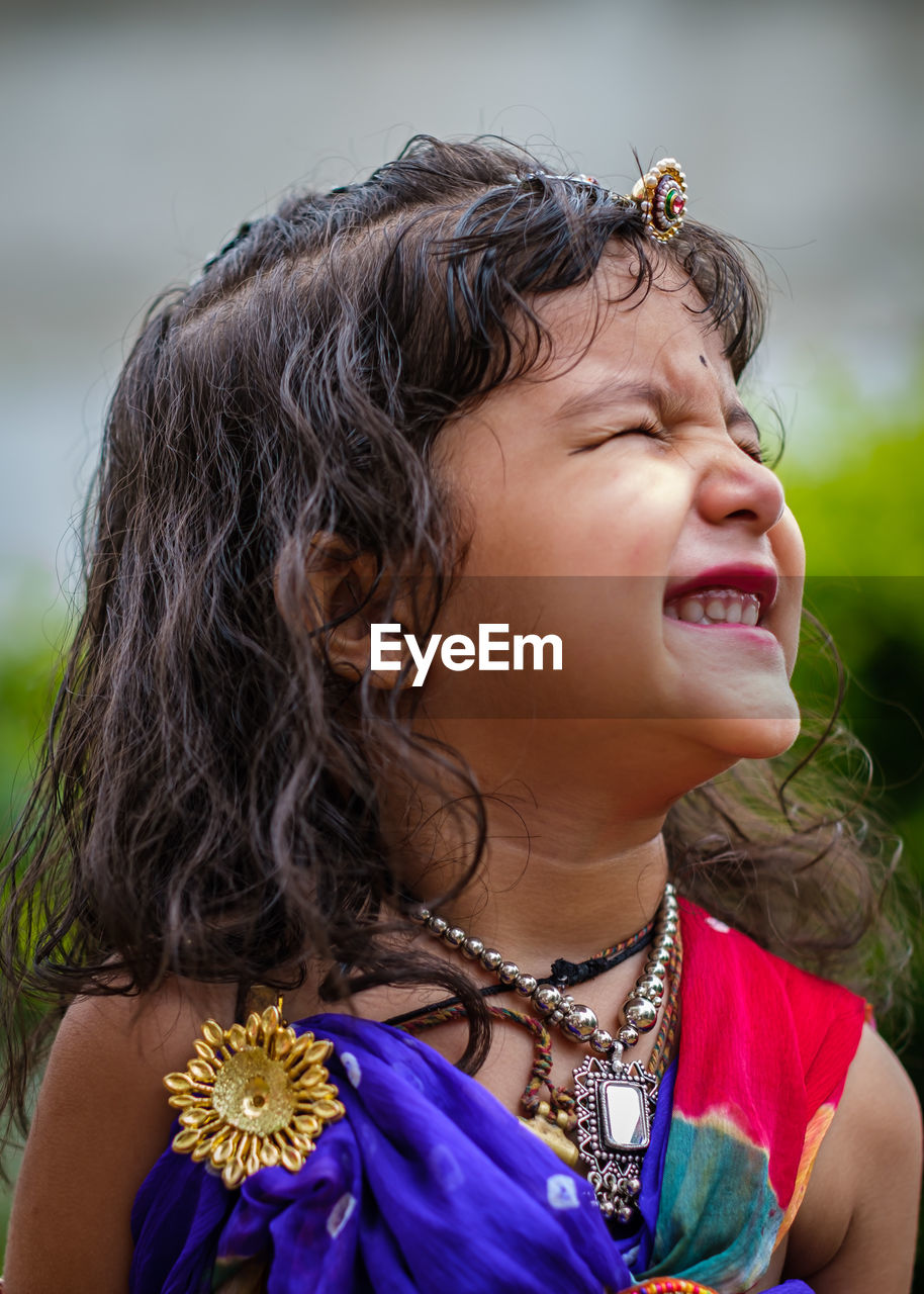 Close-up portrait of smiling girl