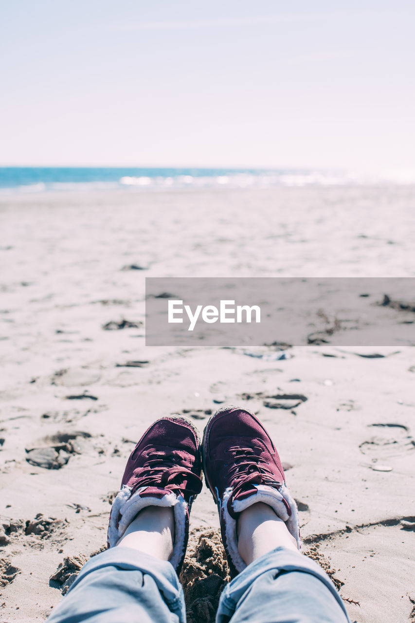 Low section of person at beach