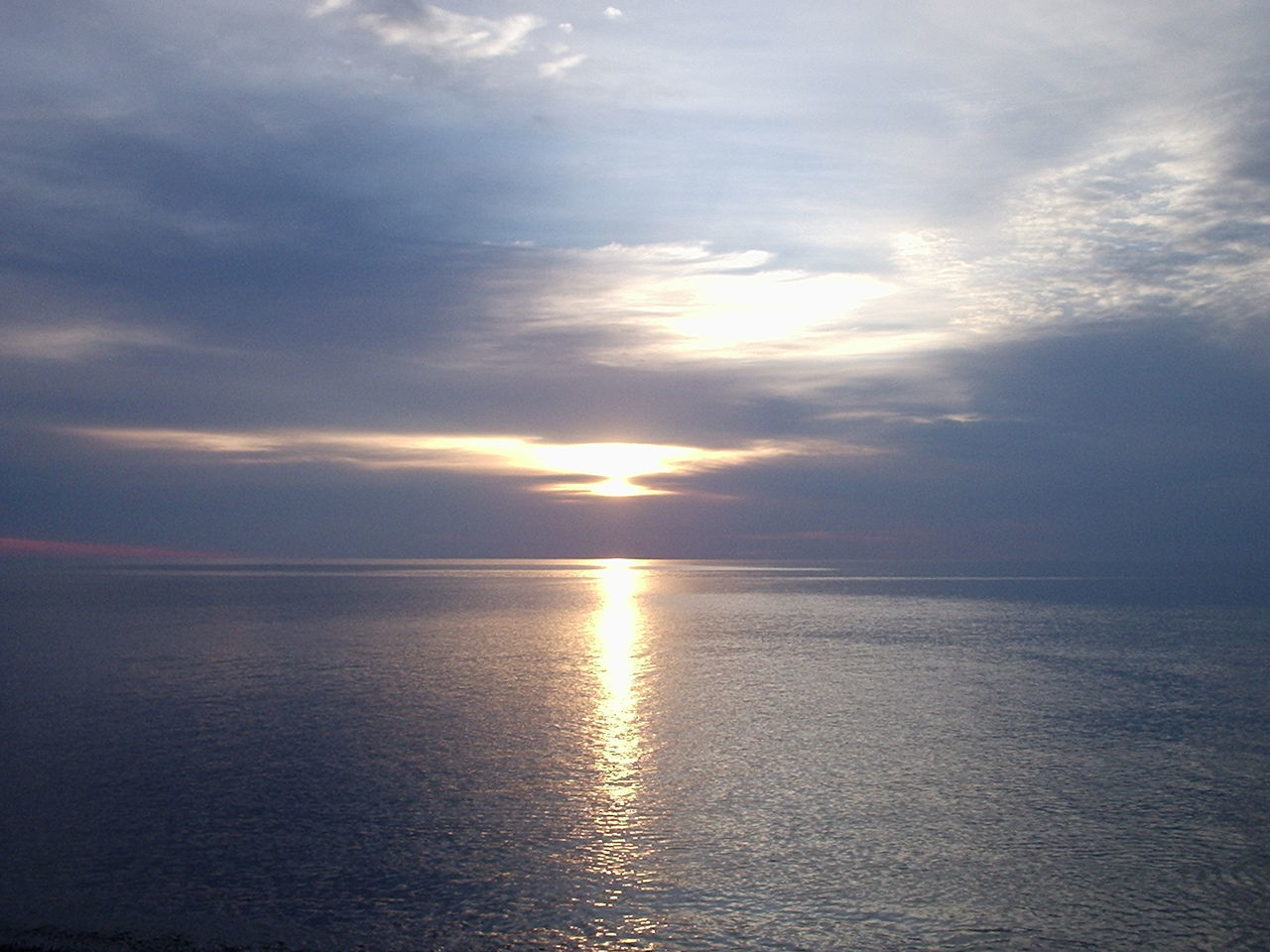 VIEW OF SEA AGAINST SKY DURING SUNSET
